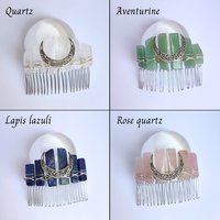 Crystal combs with silver moon in various gemstones.