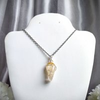 Citrine wire wrapped pendant with chain or cord.