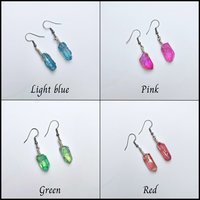 Wire wrapped titanium quartz crystal dangle earrings.