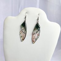 Fairy dangle earrings with clear and green resin fairy wings, glitter and diamantes. 