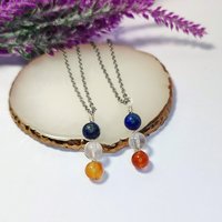 Friendship pendant with lapis lazuli, rose quartz and carnelian beads.