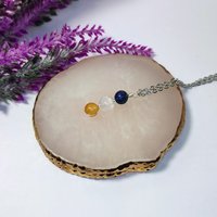 Friendship pendant with lapis lazuli, rose quartz and carnelian beads.