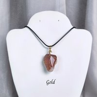 Moonstone wire wrapped pendant in gold, rose gold or copper with cord.