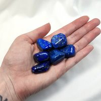 Lapis lazuli polished tumblestone.