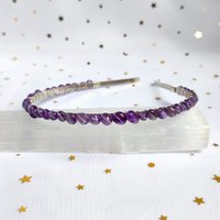 Crystal headbands with various gemstones.