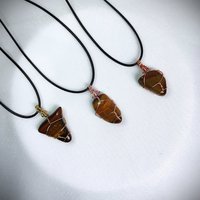 Tiger's eye wire wrapped pendant in gold, rose gold or copper.