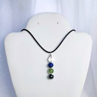 Study and exams gemstone pendant with quartz, lapis lazuli, fluorite and hematite with chain or cord.