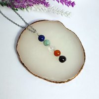 Creativity pendant with lapis lazuli, amazonite, quartz, carnelian and garnet.