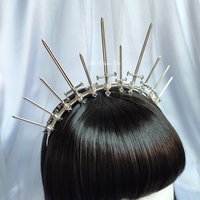 Queen of Swords Crown with silver swords wire wrapped onto a headband.