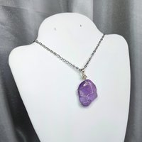 Amethyst wire wrapped pendant in silver