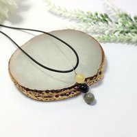 Evil entity protection pendant with citrine, onyx and labradorite.