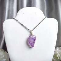 Amethyst wire wrapped pendant in silver