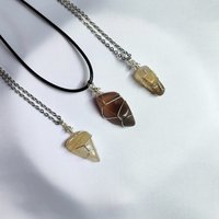 Moonstone wire wrapped pendant with chain or cord.