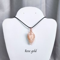 Moonstone wire wrapped pendant in gold, rose gold or copper with cord.
