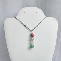 Gemstone beaded pendant with rhodochrosite, green aventurine, rose quartz and amazonite.