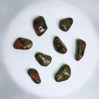 Unakite pendant wrapped in silver plated wire.