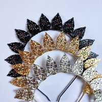 Halo crowns with filigree teardrops in silver, gold or black.