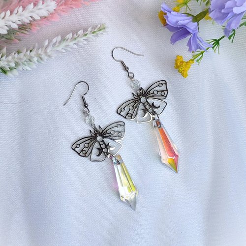 Butterfly earrings with glass crystal drops.
