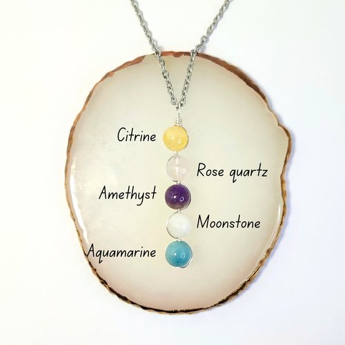 Depression pendant with citrine, rose quartz, amethyst, moonstone, aquamarine and chain or cord.