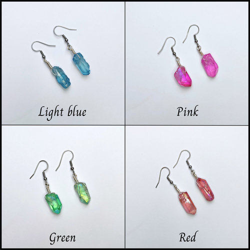 Wire wrapped titanium quartz crystal dangle earrings.