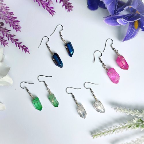Wire wrapped titanium quartz crystal dangle earrings.