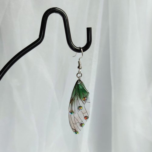 Fairy dangle earrings with clear and green resin fairy wings, glitter and diamantes. 