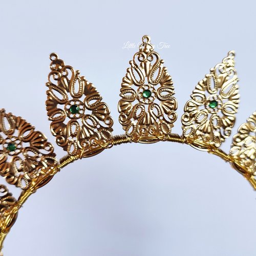 Halo crowns with filigree teardrops in silver, gold or black.