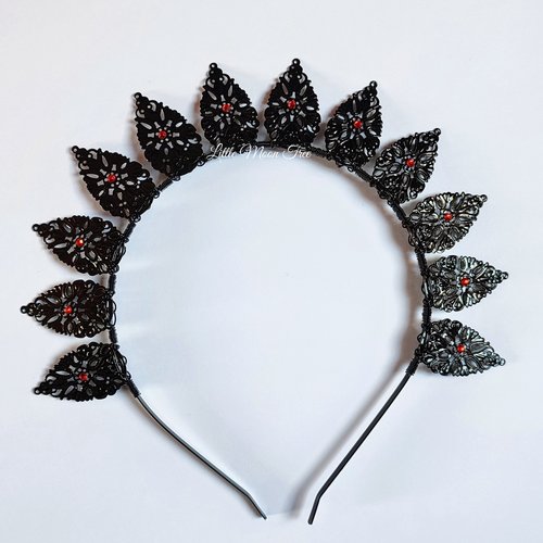 Halo crowns with filigree teardrops in silver, gold or black.