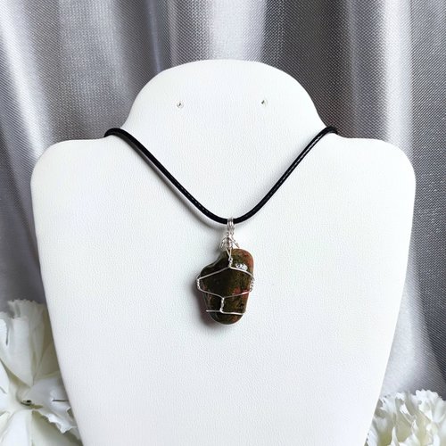 Unakite pendant wrapped in silver plated wire.