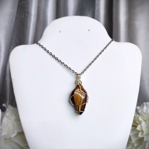 Tiger's eye wire wrapped pendant with chain or cord.