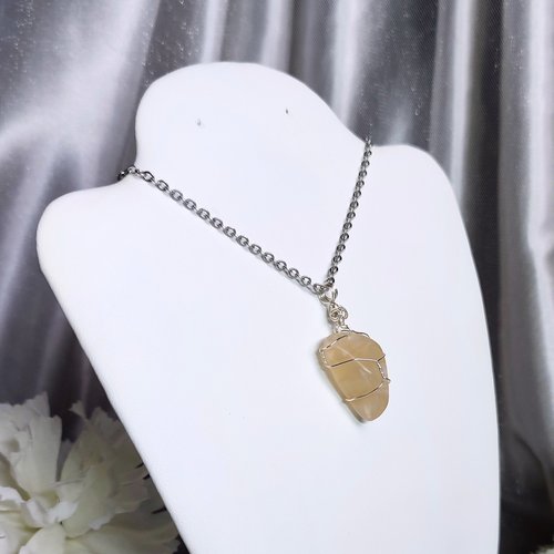 Moonstone wire wrapped pendant with chain or cord.