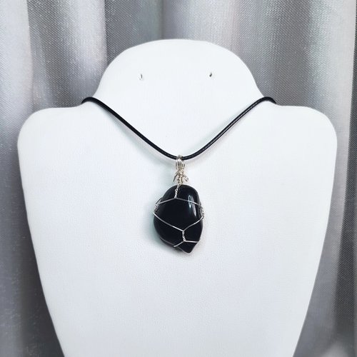 Obsidian wire wrapped pendant in silver with chain or cord.