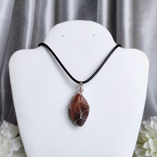 Moonstone wire wrapped pendant with chain or cord.