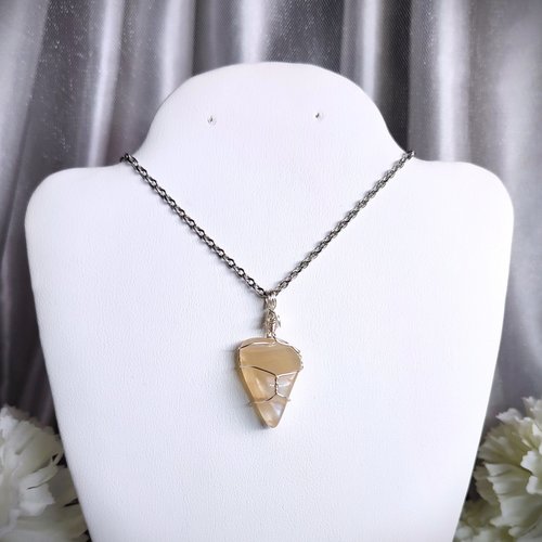 Moonstone wire wrapped pendant with chain or cord.