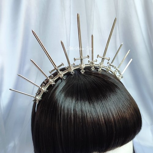 Queen of Swords Crown with silver swords wire wrapped onto a headband.