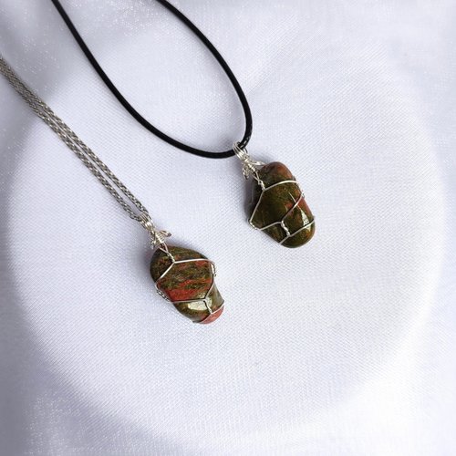 Unakite pendant wrapped in silver plated wire.