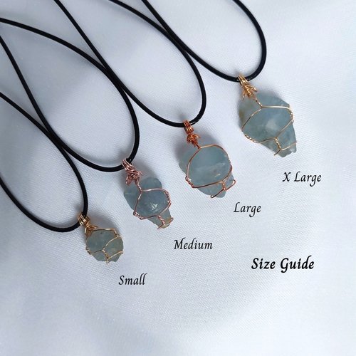 Raw celestite wrapped in gold, rose gold or copper wire with cord.