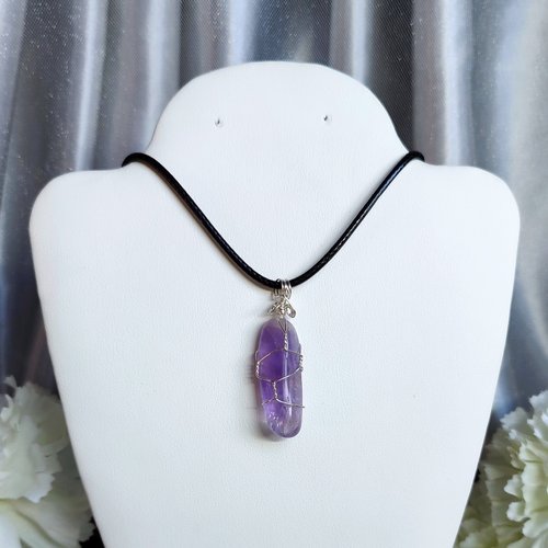 Amethyst wire wrapped pendant in silver