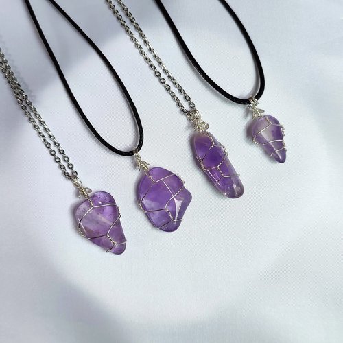 Amethyst wire wrapped pendant in silver
