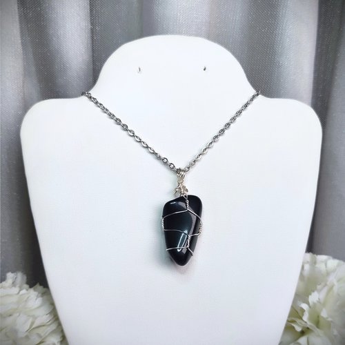 Obsidian wire wrapped pendant in silver with chain or cord.