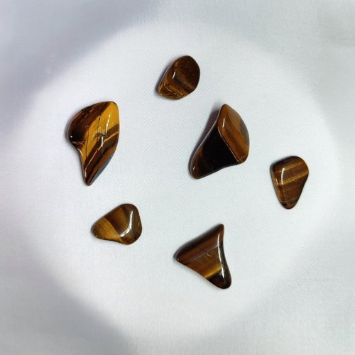 Tiger's eye wire wrapped pendant with chain or cord.
