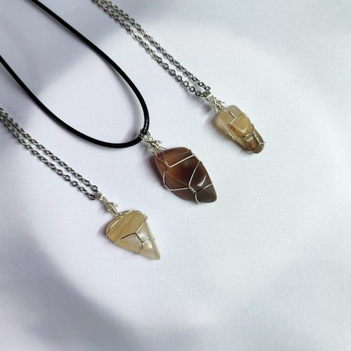 Moonstone wire wrapped pendant with chain or cord.