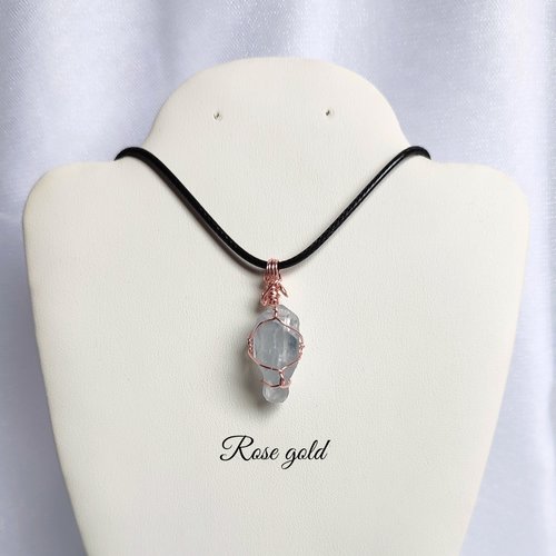 Raw celestite wrapped in gold, rose gold or copper wire with cord.