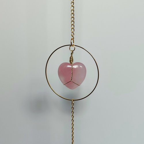 Rose quartz heart suncatcher with pink glass crystals. 