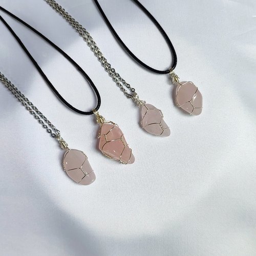 Rose quartz wire wrapped pendant in silver.