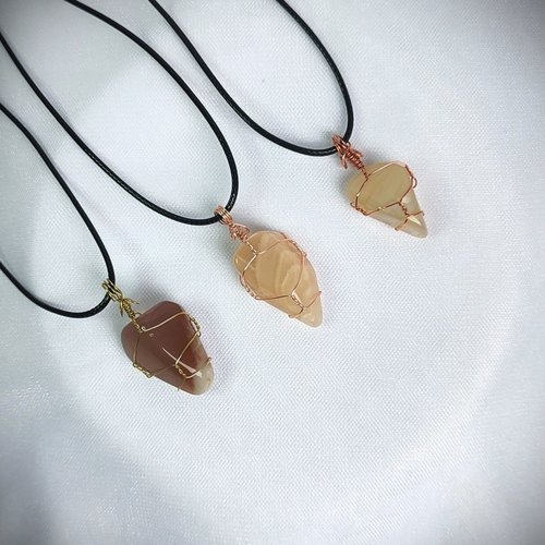 Moonstone wire wrapped pendant in gold, rose gold or copper with cord.