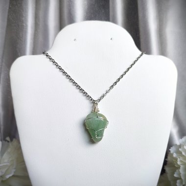 Green aventurine wire wrapped pendant in silver.