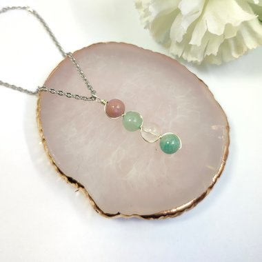 Gemstone beaded pendant with rhodochrosite, green aventurine, rose quartz and amazonite.