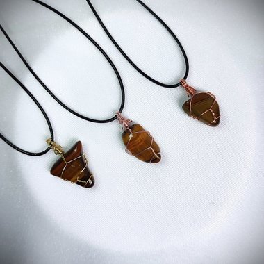 Tiger's eye wire wrapped pendant in gold, rose gold or copper.