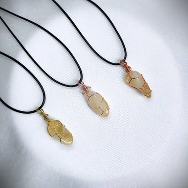 Citrine wire wrapped pendant in gold, rose gold or copper with cord.